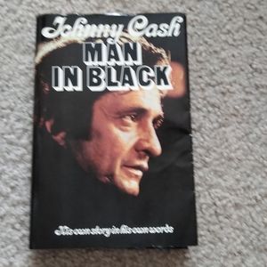 Vintage Johnny cash man in black autographed book